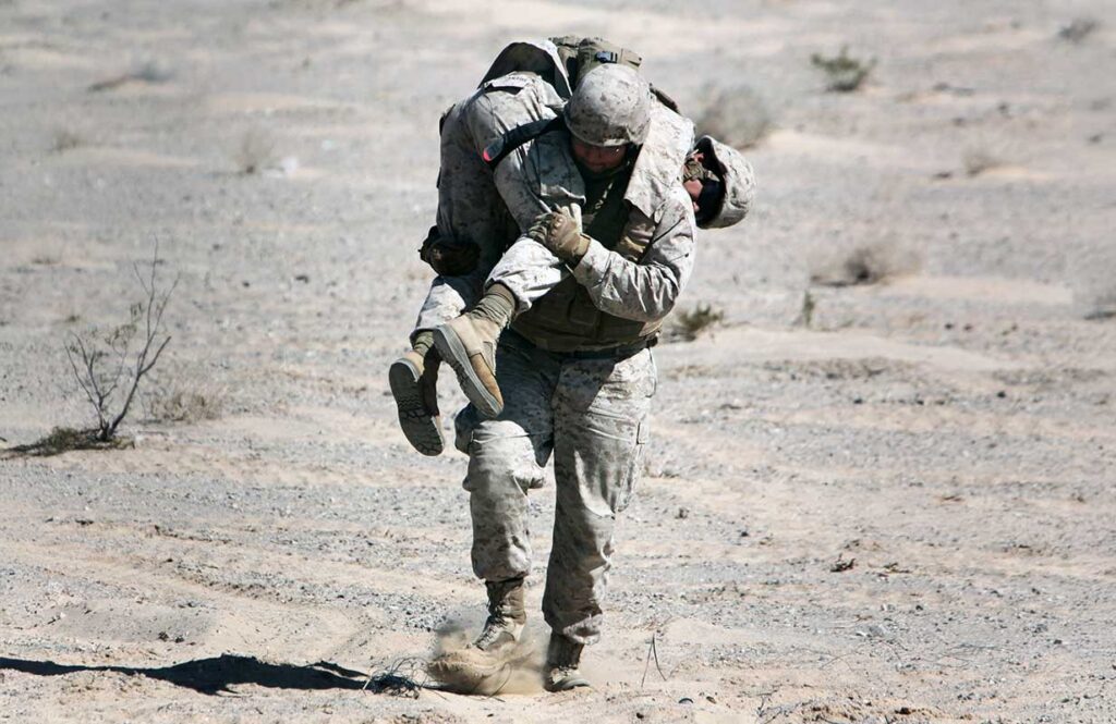corpsman-carrying-Marine