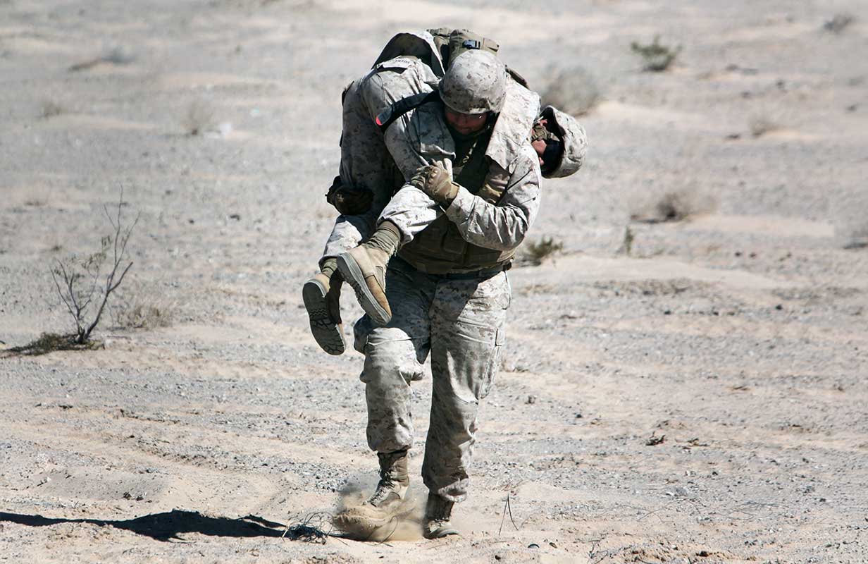 corpsman-carrying-Marine